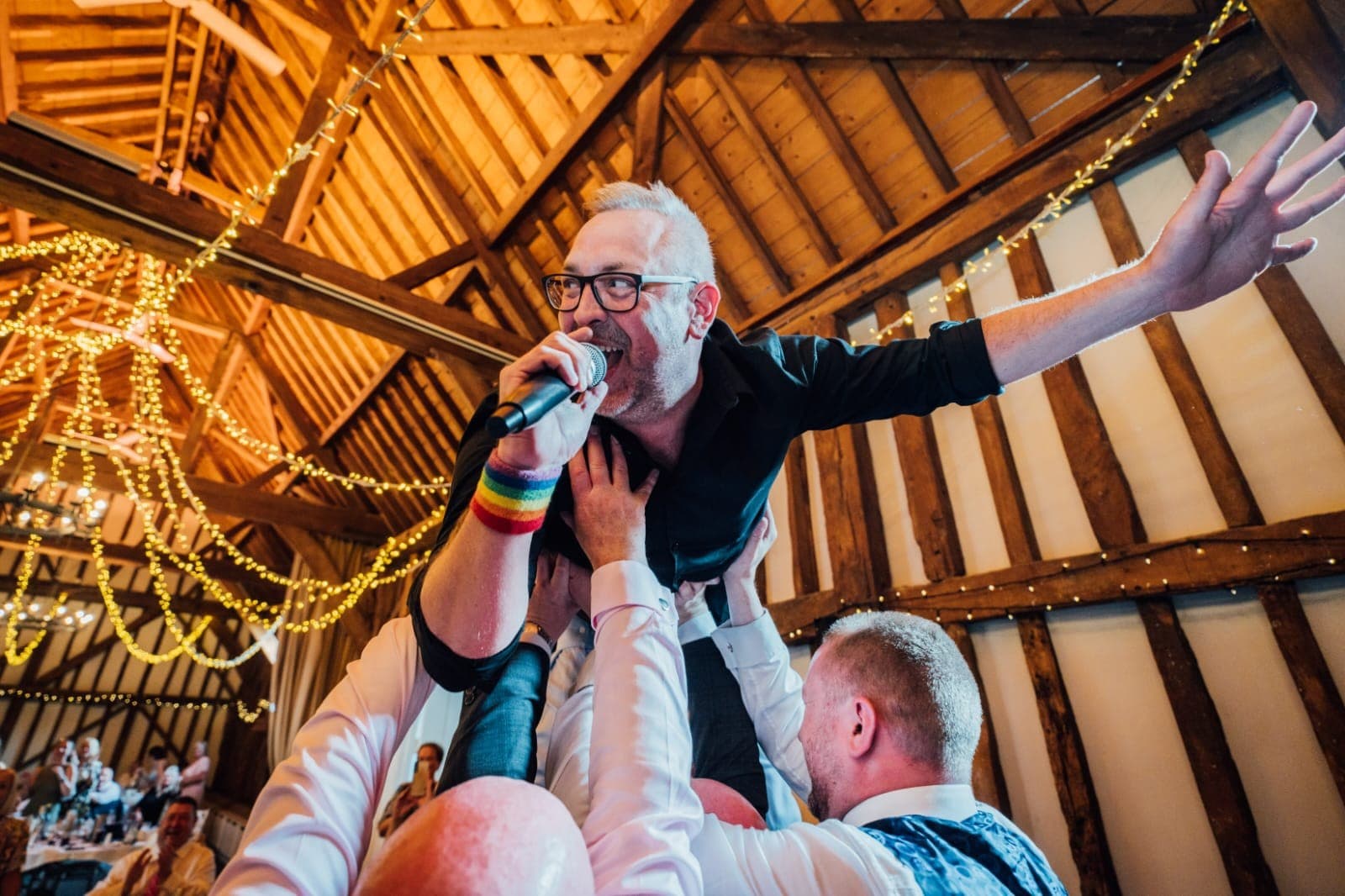Wedding guests singing and dancing